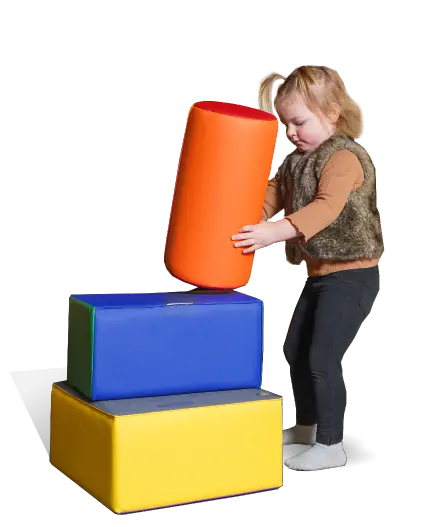 girl building with soft blocks