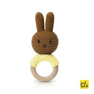 Pastel yellow handmade Melanie teether with a rabbit-shaped head, soft fabric body, and a round teething ring at the bottom.