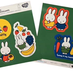 Two illustrated cards with Miffy designs standing upright with different accessoires.