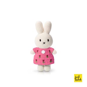 Knitted white Miffy rabbit in a pink dress with a tulip pattern.