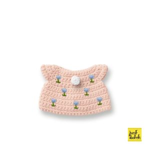 Knitted pastel pink tulip dress with short sleeves and a flared skirt, displayed flat.