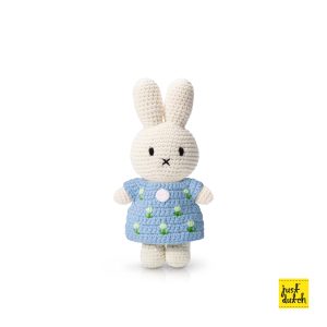 Knitted white Miffy rabbit in a pastel blue dress with a tulip pattern.
