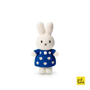 Knitted white Miffy rabbit in a blue dress with a flower pattern.