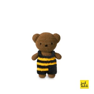 Knitted brown bear in a yellow and black striped overall.