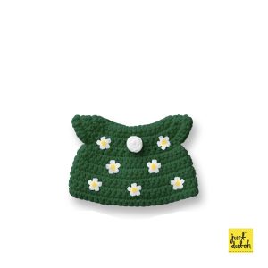 Knitted green dress with a floral pattern.