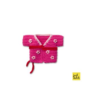 Knitted pink kimono with a small floral print pattern, featuring short sleeves and a wrap-style front closure.