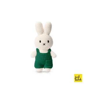 Knitted white Miffy rabbit in a green overall.