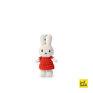 Knitted white Miffy rabbit keyhanger in a red colored dress.