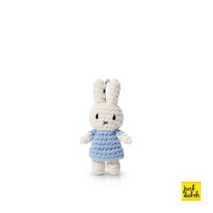 Knitted white Miffy rabbit keyhanger in a pastel blue colored dress.