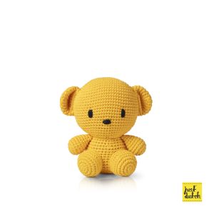 Knitted yellow knitted bear with rounded ears.