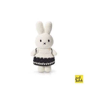 Knitted white Miffy rabbit in a cream outfit with dark trim details.