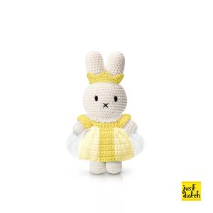 Knitted white Miffy rabbit in a pastel yellow princess outfit with matching crown.