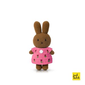 Brown knitted rabbit figure wearing a pink tulip-patterned dress.